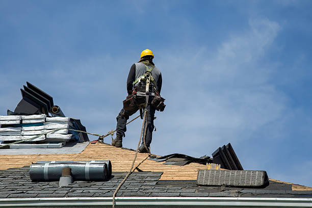 Professional Roof Repair technician working in Hastings, NY